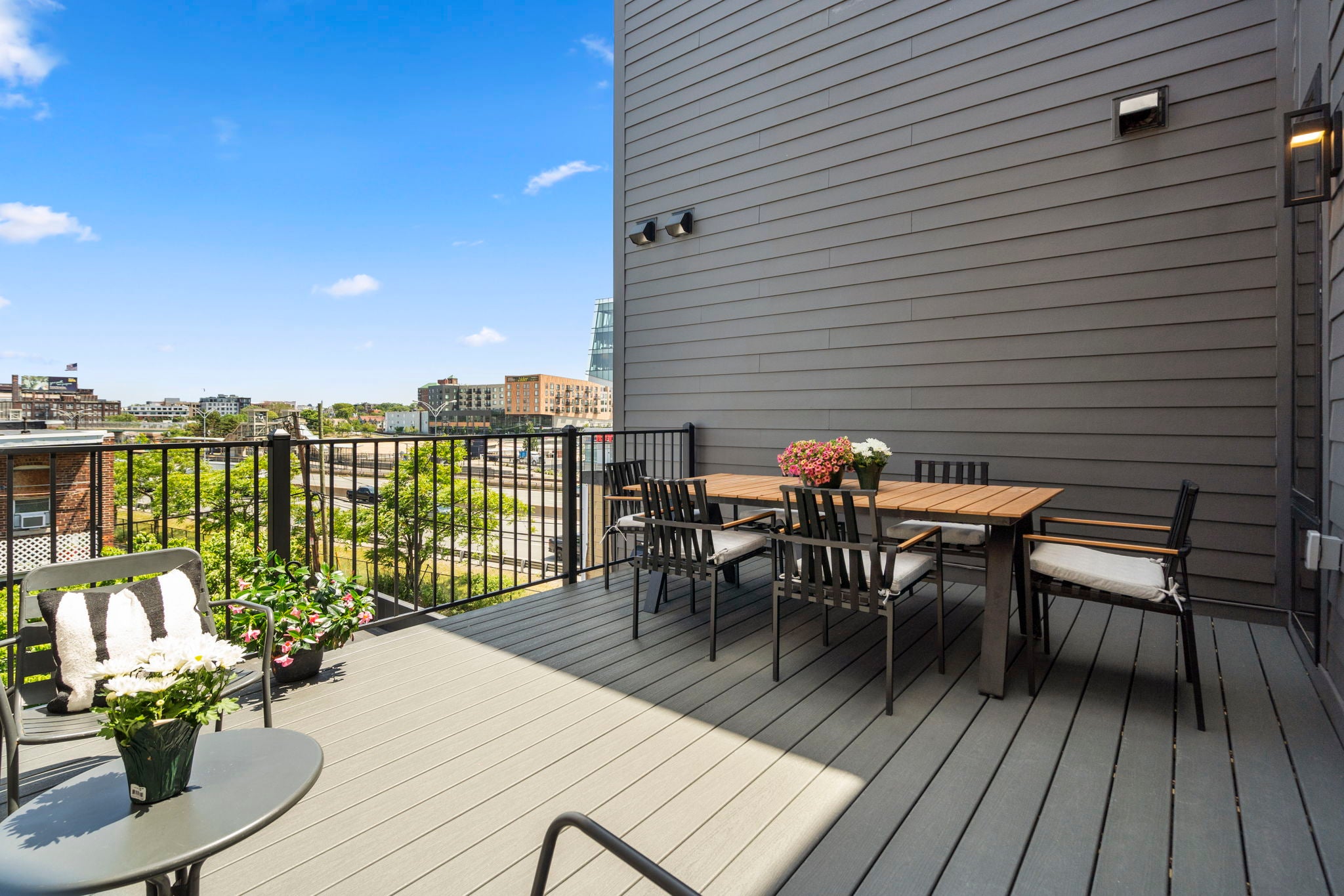 The private deck looks out over the city.