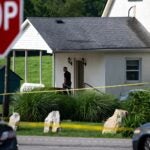Kentucky -- Police assess the scene after a shooting at Richmond Road Baptist Church on July 13, 2025 in Lexington, Kentucky.
