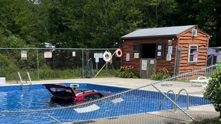 Car ends up in pool at Mass. campground, barely missing swimmers