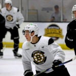 Bruins development camp at Warrior Arena in Boston on July 3, 2025, Boston Bruins draft picks James Hagens ( in center white helmet and jersey.