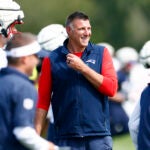 New England Patriots head coach Mike Vrabel on the field during NFL training camp at Gillette Stadium on Aug. 24, 2025.