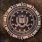 The seal of The Federal Bureau of Investigation.