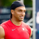 New England Patriots wide receiver Mack Hollins (13) walks onto the field for NFL training camp at Gillette Stadium on Aug. 4, 2025.