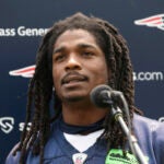 New England Patriots safety Kyle Dugger faces reporter following an NFL football offseason workout, Tuesday, June 6, 2023, in Foxborough, Mass.