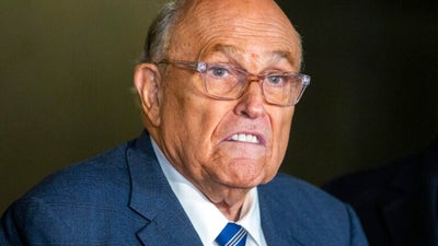 Rudy Giuliani leaves the hospital after being injured in a car crash in