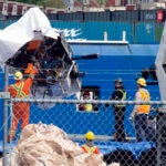 FILE - Debris from the Titan submersible, recovered from the ocean floor near the wreck of the Titanic, is unloaded from the ship Horizon Arctic at the Canadian Coast Guard pier in St. John's, Newfoundland, Wednesday, June 28, 2023.