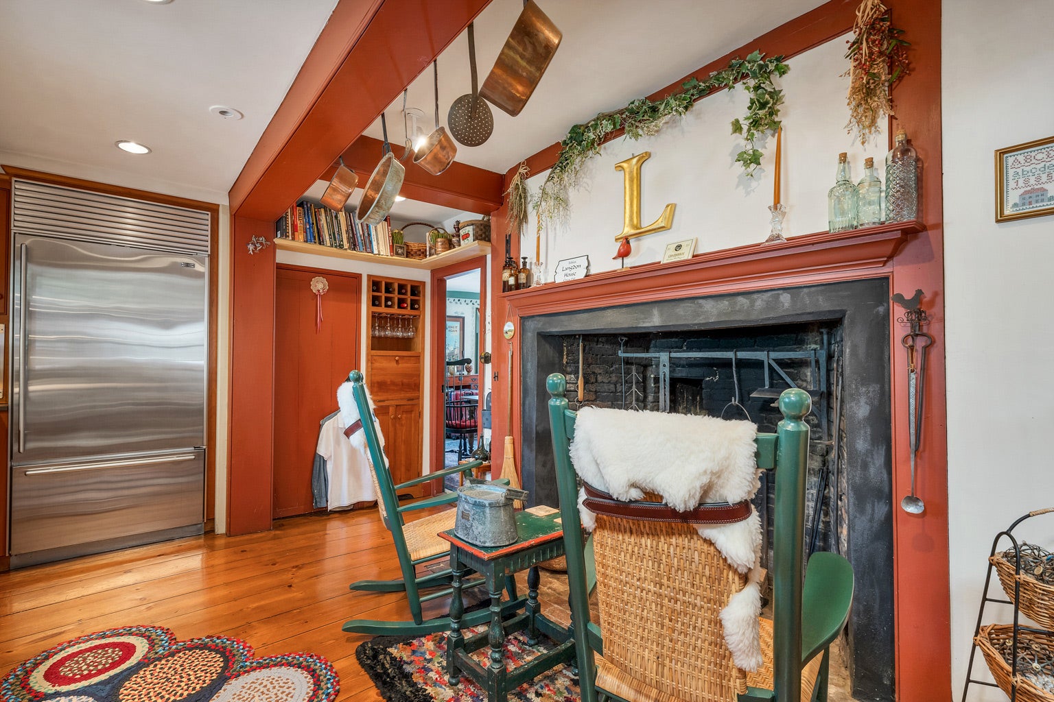 A corner of the kitchen features a fireplace.