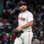 Boston Red Sox relief pitcher Liam Hendriks (31) heads off the field during a pitching change in the 7th. The Boston Red Sox host the New York Mets on Wednesday, May 21, 2025 at Fenway Park in Boston, MA.
