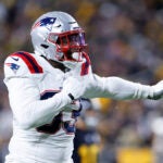 New England Patriots linebacker Anfernee Jennings (33) celebrates a tackle in the first half at Acrisure Stadium.