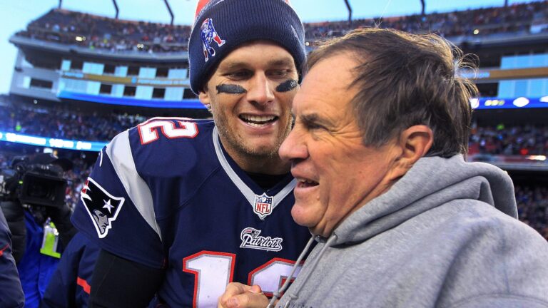 Tom Brady and head coach Bill Belichick share a moment as the final seconds tick off the clock in their victory, which gave them their 6th straight AFC East title. The New England Patriots hosted the Miami Dolphins in a regular season NFL game at Gillette Stadium.