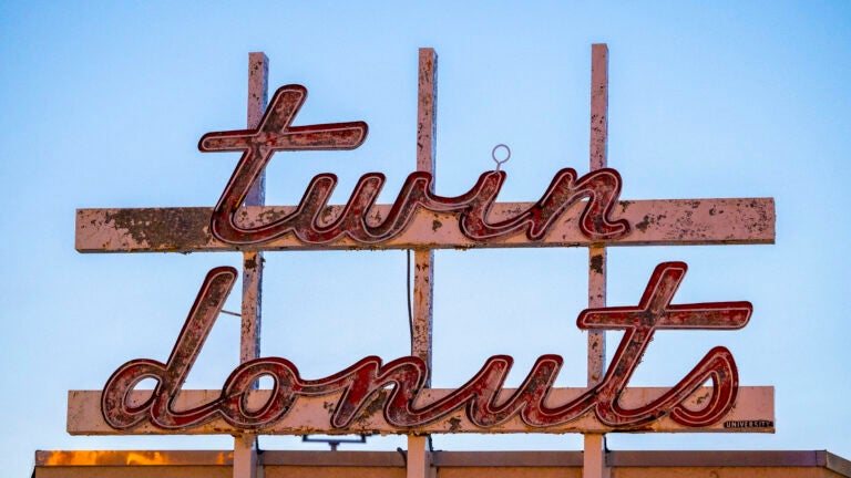 The iconic Twin Donuts neon sign will be restored by Blank Street for its new location.