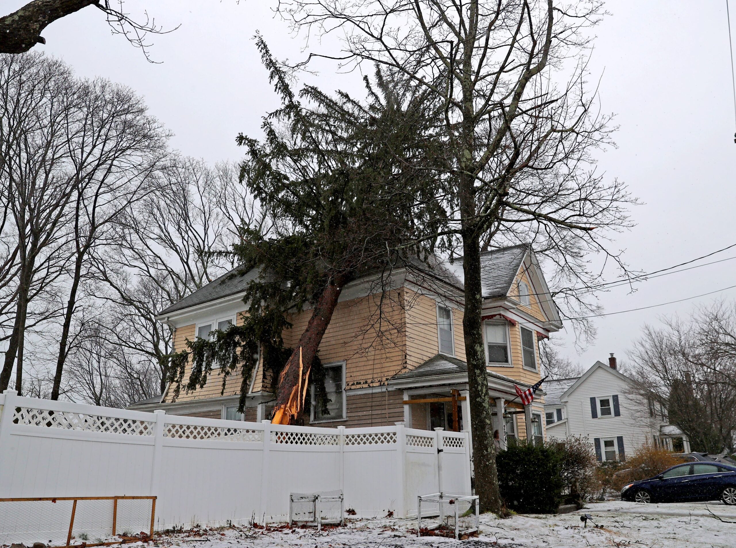 her curves illuminated in the dim light