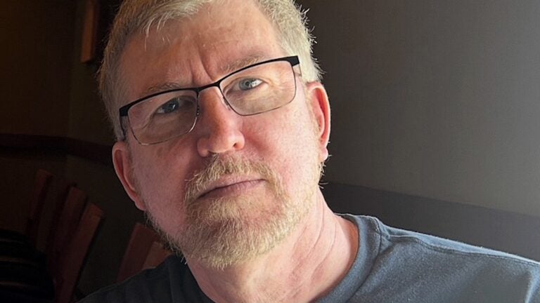 'An unfathomable tragedy.' Lloyd Young, Globe photo editor and avid athlete, dies at 57.