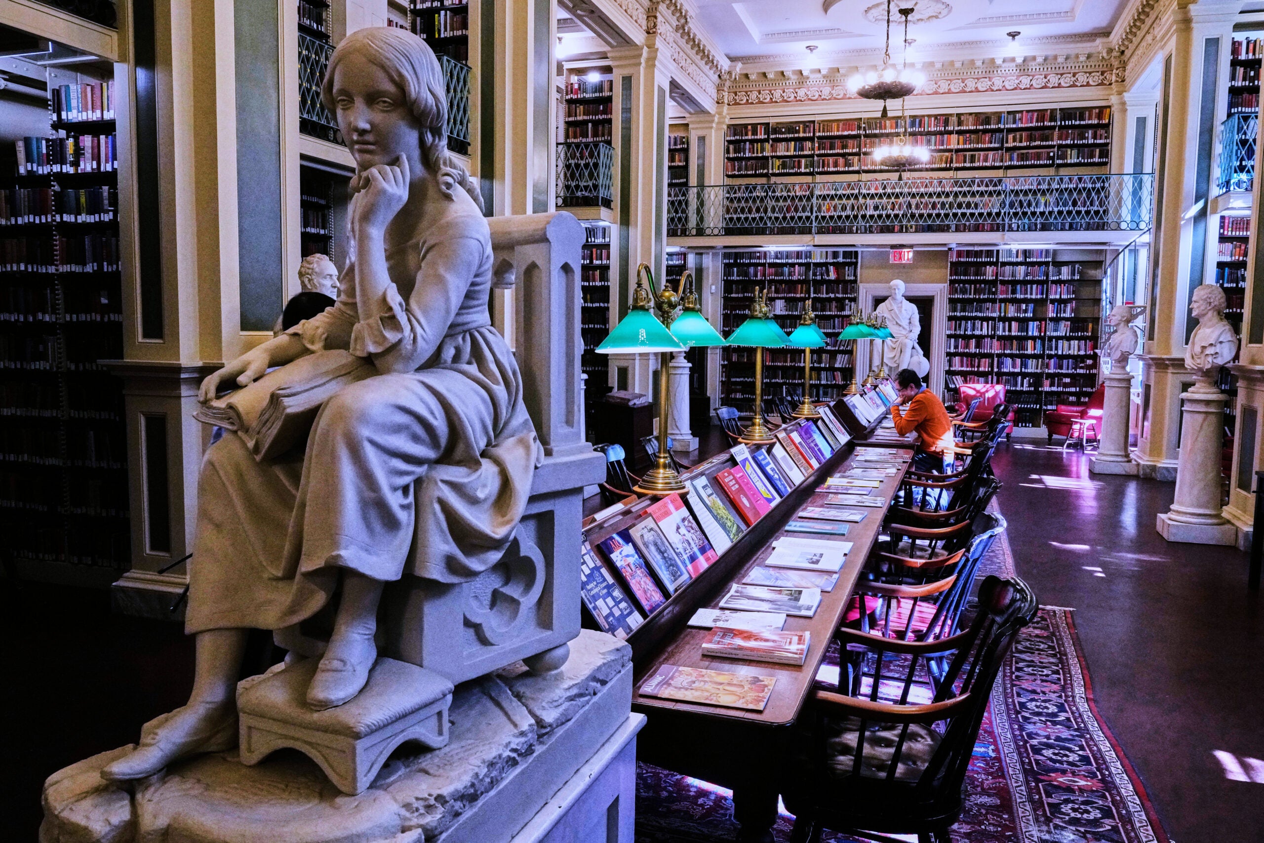 Little Nell, a sculpture of the character from Charles Dickens's "The Old Curiosity Shop", is displayed at the Boston Athenaeum.