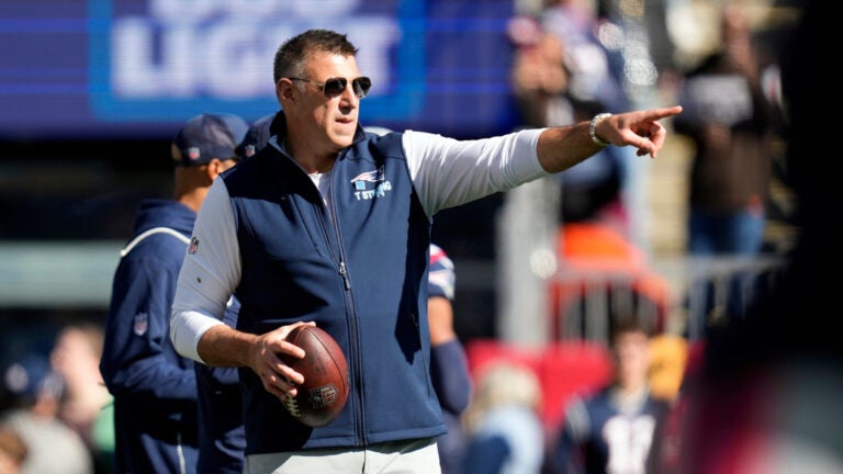 New England Patriots head coach Mike Vrabel directs players as they warm up before an NFL football game against the Cleveland Browns on Sunday, Oct. 26, 2025, in Foxborough, Mass.