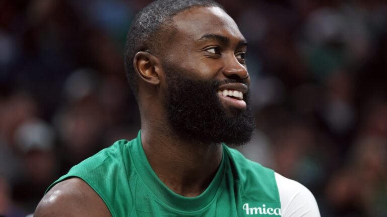 Boston Celtics' Jaylen Brown sits on the bench during the second half of a preseason NBA basketball game against the Cleveland Cavaliers, Sunday, Oct. 12, 2025, in Boston.