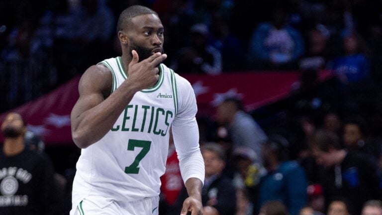 Jaylen Brown celebrates on the court.