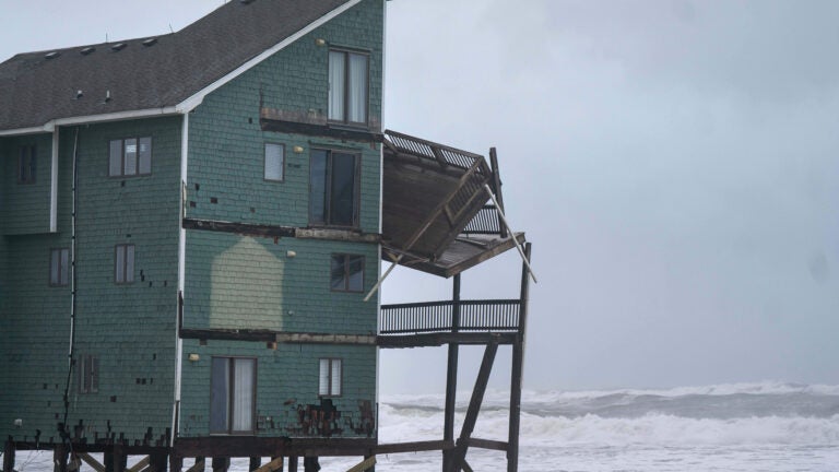 Dozens rescued as remnants of typhoon hits Alaska while nor'easter brings flooding to East Coast