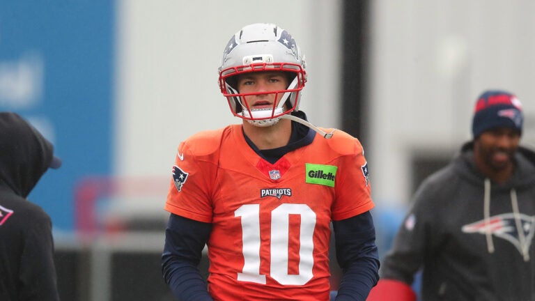 The NE Patriots held practice at the Gillette Stadium practice field. Qb Drake Maye walks to a passing drill.