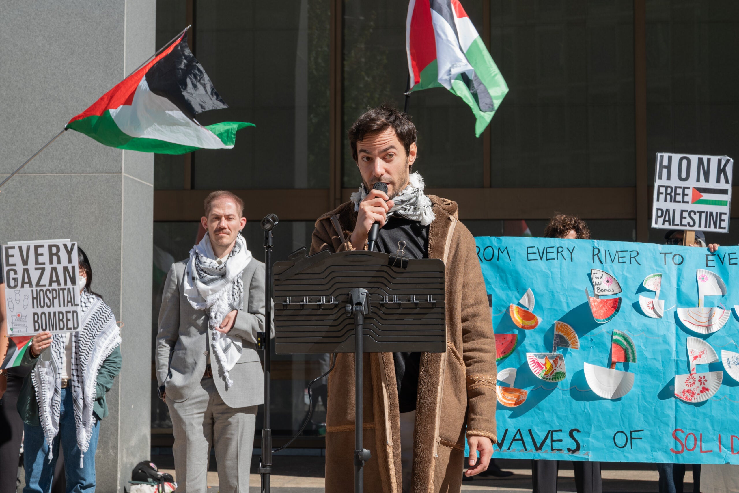 Sam Stein, a Jewish-American hunger striker from Cambridge, speaks at the People's Hunger Strike rally.