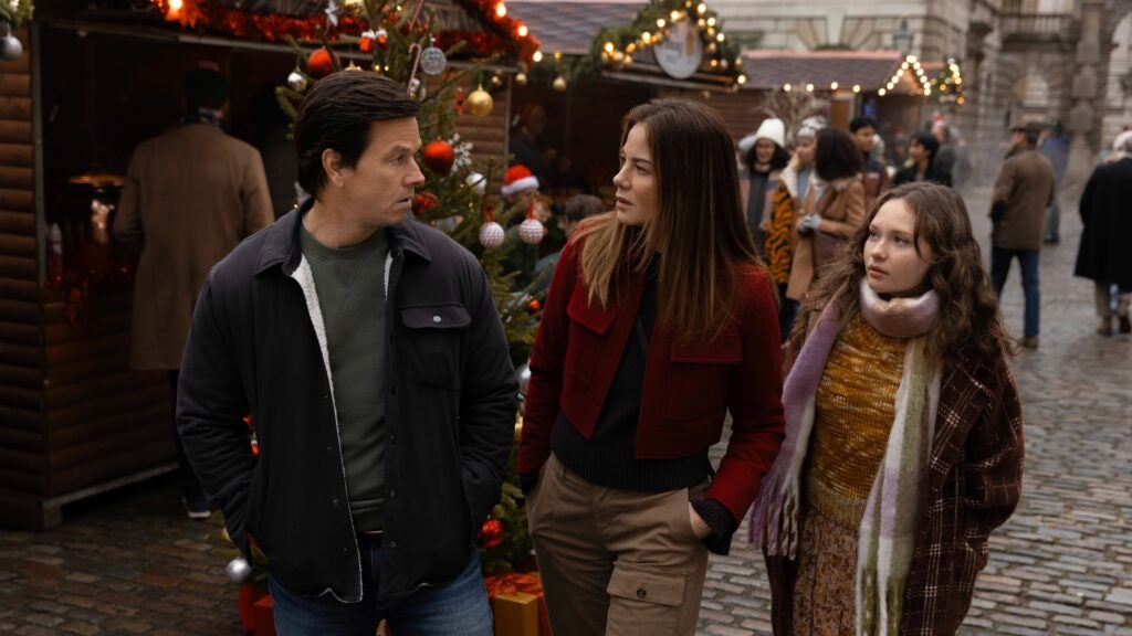 2025 holiday movies: Mark Wahlberg, Michelle Monaghan and Zoe Colletti in "The Family Plan 2," streaming November 21, 2025 on Apple TV.