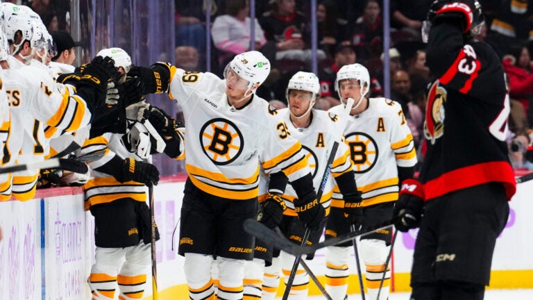 Boston Bruins Morgan Geekie (39) celebrates his goal with the bench while taking on the Ottawa Senators during second period NHL hockey action in Ottawa on Thursday, Nov. 13, 2025.
