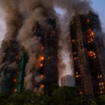 Smoke rises after a fire broke out at Wang Fuk Court, a residential estate in the Tai Po district of Hong Kong's New Territories.