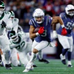 New England Patriots wide receiver Mack Hollins (13) runs with the ball during the second quarter. The New England Patriots played the New York Jets at Gillette Stadium on November 13, 2025.