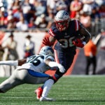 New England Patriots' Rhamondre Stevenson runs against the Carolina Panthers during an NFL football game at Gillette Stadium, Sunday, Sept. 28, 2025 in Foxborough, Mass.