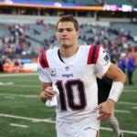 New England Patriots quarterback Drake Maye (10) leaves the field following an NFL football game against the Cincinnati Bengals, Sunday, Nov 23, 2025, in Cincinnati, OH