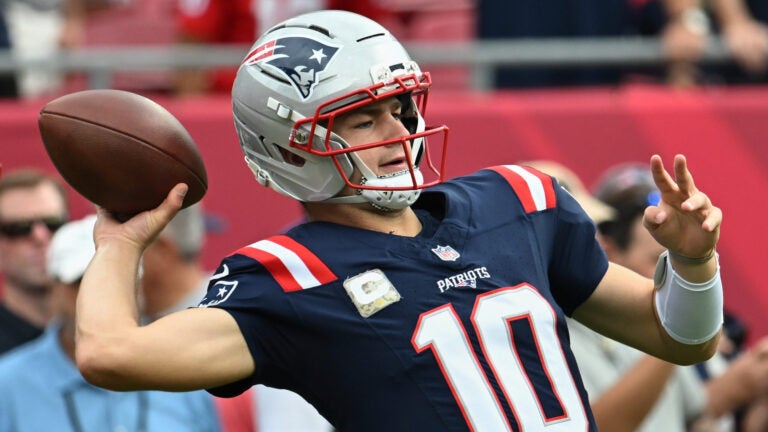 New England Patriots quarterback Drake Maye (10) warms up before an NFL football game between the Tampa Bay Buccaneers and the New England Patriots, Sunday, Nov. 9, 2025, in Tampa, Fla.
