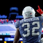 New England Patriots running back TreVeyon Henderson (32) scores a touchdown during the third quarter. The New England Patriots played the New York Jets at Gillette Stadium on November 13, 2025.(