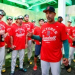 Boston Red Sox head coach Alex Cora speaks in the locker room after defeating the Detroit Tigers in a baseball game, Friday, Sept. 26, 2025, in Boston.