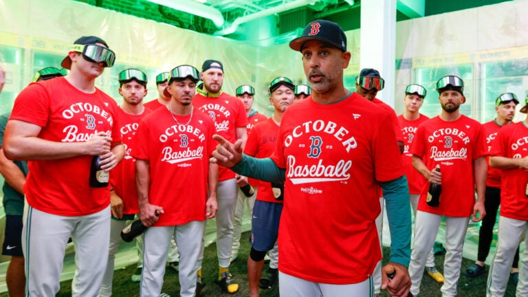 Boston Red Sox head coach Alex Cora speaks in the locker room after defeating the Detroit Tigers in a baseball game, Friday, Sept. 26, 2025, in Boston.