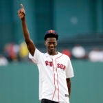 Brockton native and BYU freshman basketball player AJ Dybantsa throws out the first pitch at Fenway Park on July 10, 2025.