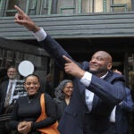 Ricky McGee walks free Oct. 14 outside Suffolk Superior Court nearly three decades after he was convicted of murder.