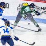 Toronto Sceptres forward Julia Gosling (88), Toronto Sceptres defense Renata Fast (14) and Boston Fleet defense Megan Keller (5) scramble for the puck during the game on Wednesday, March 26, 2025, at Agganis Arena. The Toronto Sceptres won 4 - 2.