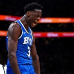 BYU Cougars forward AJ Dybantsa (3) reacts with a howl after scoring to bring BYU with in 5 points of UConn 75-70 during the 2nd half. The Connecticut Huskies played the Brigham Young Cougars Saturday, November 15, 2025 at TD Garden in Boston, MA.