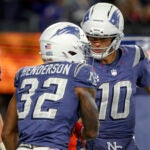 New England Patriots running back TreVeyon Henderson #32 celebrates his rushing touchdown with teammate quarterback Drake Maye #10 against the New York Jets during the second quarter. The New England Patriots played the New York Jets at Gillette Stadium on November 13, 2025.