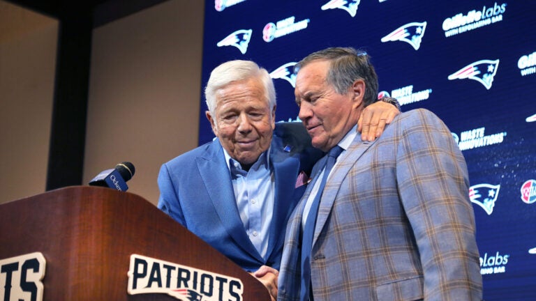 Robert Kraft puts his arm around former Patriots coach Bill Belichick at the end of a media availability. New England Patriots owner Robert Kraft and departing head coach Bill Belichick addressed the media at Gillette Stadium about the departure of Belichick.