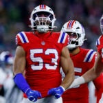 New England Patriots linebacker Christian Elliss (53) reacts after forcing a fumble as New England Patriots linebackers Jack Gibbens (51) and Caleb Murphy (45) look on during the second quarter. The New England Patriots played the New York Giants at Gillette Stadium on December 1, 2025.