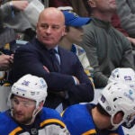 St. Louis Blues head coach Jim Montgomery () in the second period of an NHL hockey game Saturday, March 29, 2025, in Denver.