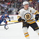 Boston Bruins defenseman Charlie McAvoy (73) in the third period of an NHL hockey game Saturday, Oct. 18, 2025, in Denver.