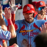 St. Louis Cardinals' Willson Contreras is congratulated by his teammates after hitting a solo home run off Cleveland Guardians relief pitcher Kolby Allard during the ninth inning of a baseball game, Saturday, June 28, 2025, in Cleveland.