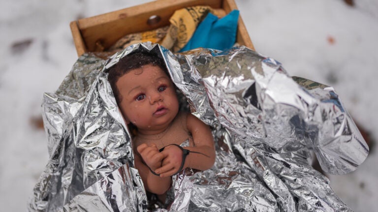 Illinois church Nativity scenes add zip ties, gas masks, and ICE to protest immigration raids