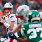 New England Patriots quarterback Drake Maye (10) throws against the New York Jets during the second quarter. The New England Patriots played the New York Jets at MetLife Stadium on December 28, 2025.