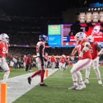 New England Patriots wide receiver Kayshon Boutte (9) celebrates a touchdown with teammates against the New York Giants during the first half of an NFL football game on Monday, Dec. 1, 2025, in Foxborough, Mass.