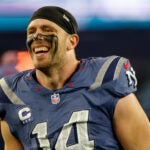 New England Patriots linebacker Robert Spillane (14) reacts after defeating the New York Jets in an NFL football game, Thursday, Nov. 13, 2025, in Foxborough, Mass.