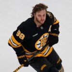 Boston Bruins right wing David Pastrnak (88) skates before an NHL hockey game, Tuesday, Dec. 16, 2025, in Boston.