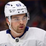 Toronto Maple Leafs left wing Matias MacCelli (63) lines up for a faceoff during the second period of an NHL hockey game against the Buffalo Sabres Friday, Oct. 24, 2025, in Buffalo, N.Y.